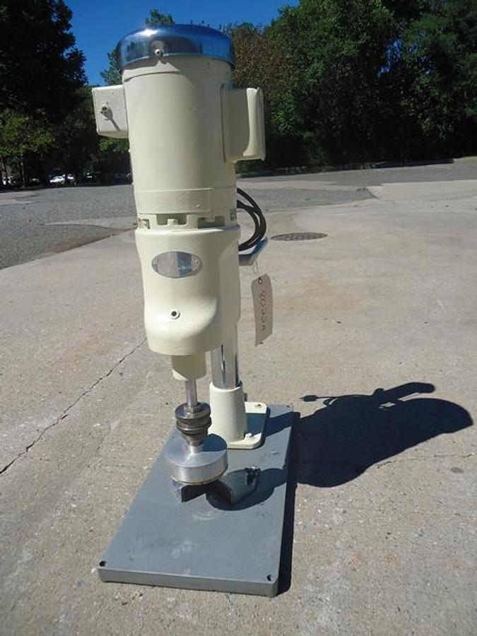 Used Swanmatic 49PC Bench Top Semi-Automatic Capper, Single Phase