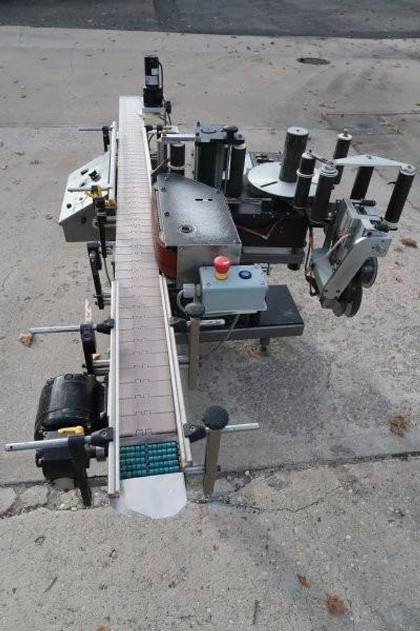 Used LSI Auto Pressure Sensitive Wraparound Labeler with Coder