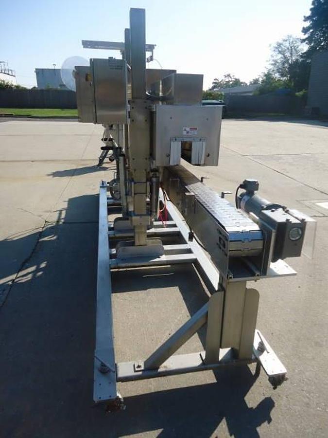 Used Axon Ez-130 Sleeving System With Twin Shrink Tunnels, 15 Ft. Conveyor