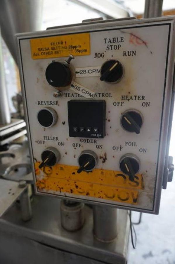 Used World Cup Model 8-12 Rotary Cup Filling/Sealing Machine, 45 Per Minute
