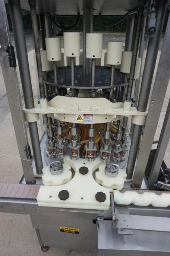 Used 18 Head Rotary Pressure Gravity Liquid Filling Machine