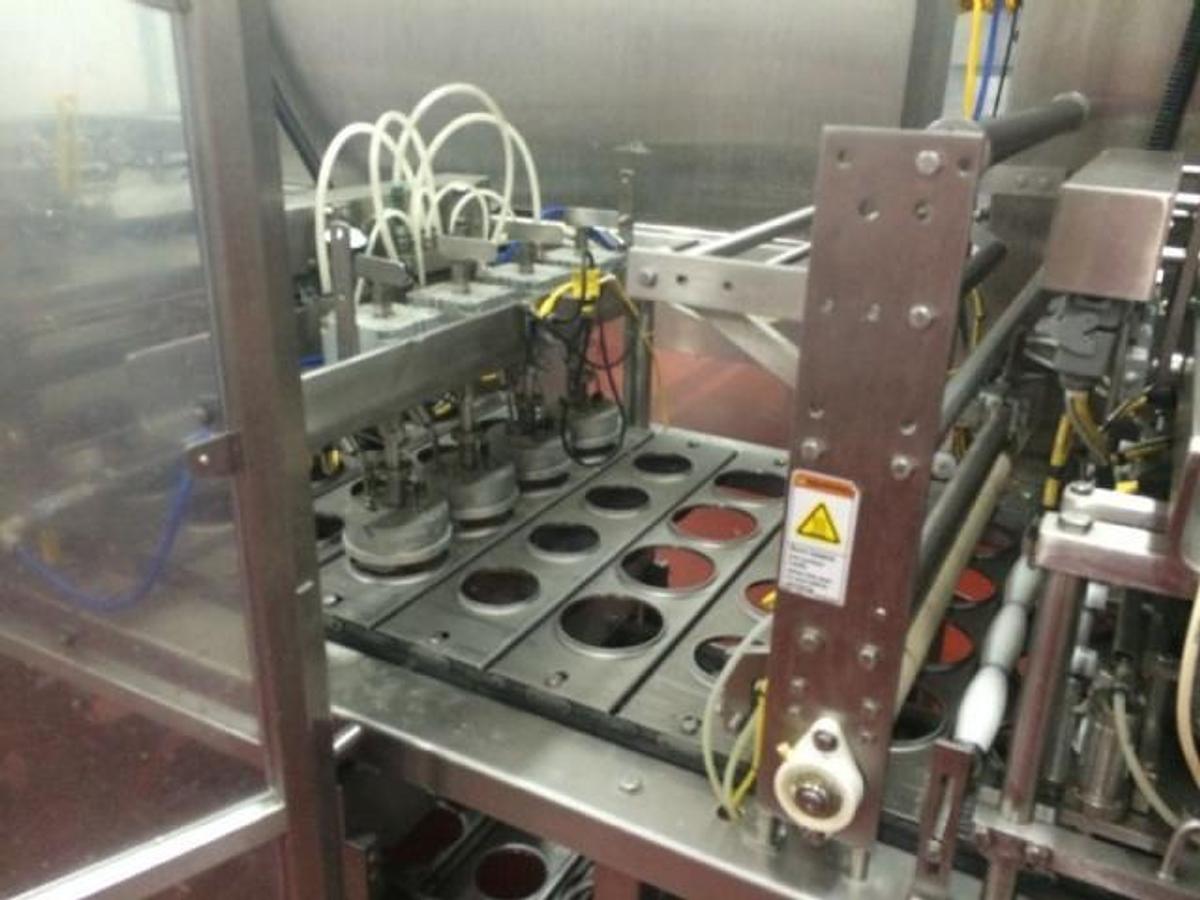 Used Osgood Four Lane Cup Filling System, 3.5 In. & 4.5 In. Diameter Tooling