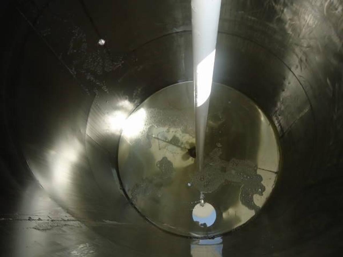 Used 2,000 Gallon stainless steel vertical tank, dished bottom