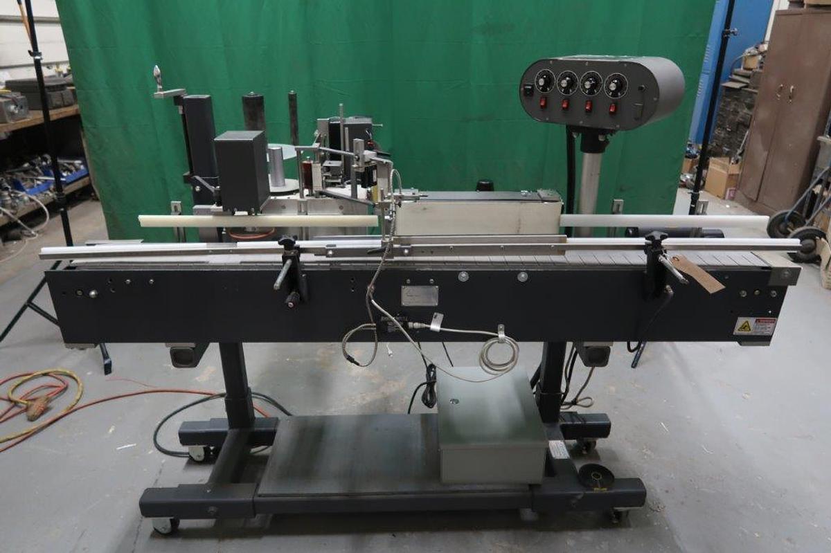 Used Universal R-320 Automatic Pressure Sensitive Labeling Machine, Portable
