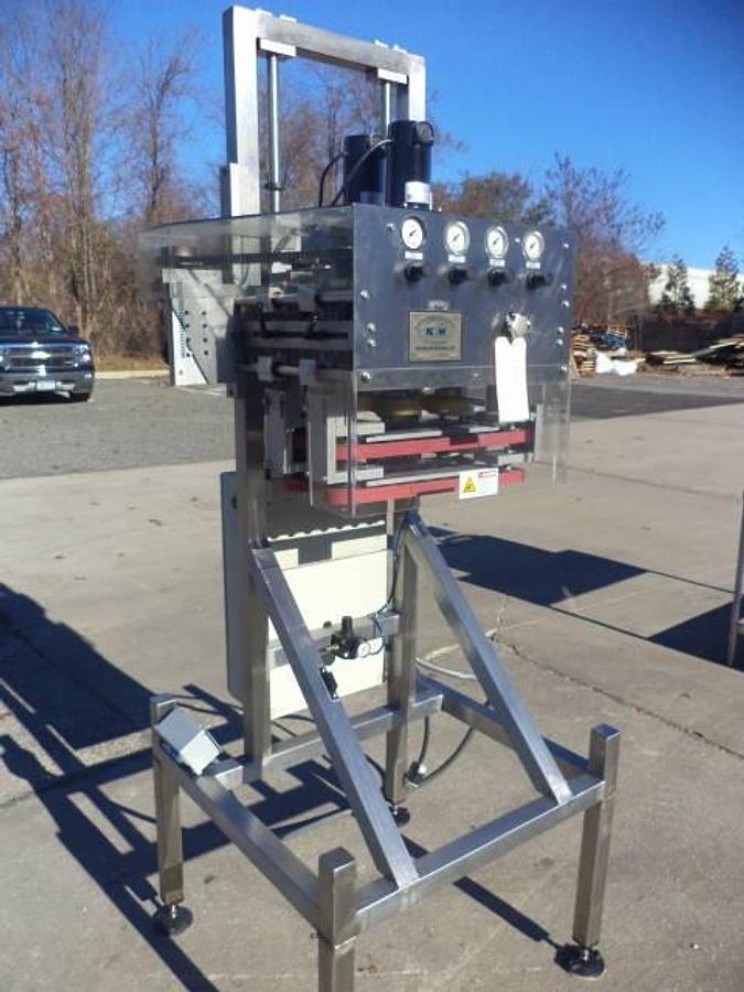 Used New England Four Spindle Cap Tightener, Single Phase