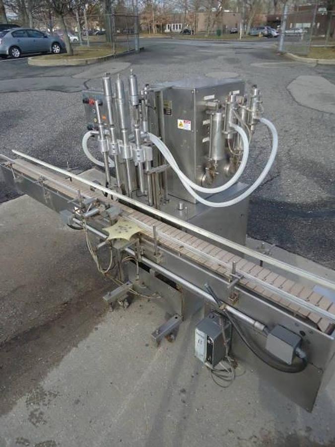 Used NATIONAL INSTRUMENT “FILAMATIC”” FOUR PISTON FILLER WITH CONVEYOR, 32 oz. pistons