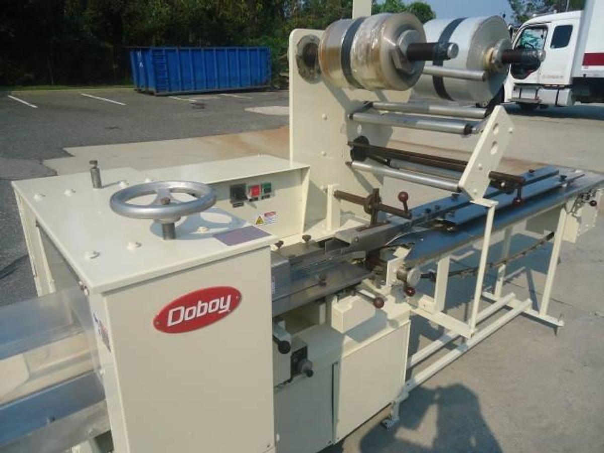 Used DOBOY “SUPER MUSTANG” HORIZONTAL WRAPPER, 120 Per Minute