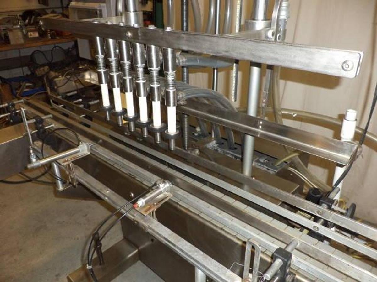 Used Kaps-All/Filz-All Automatic Gravity Overflow Liquid Filler