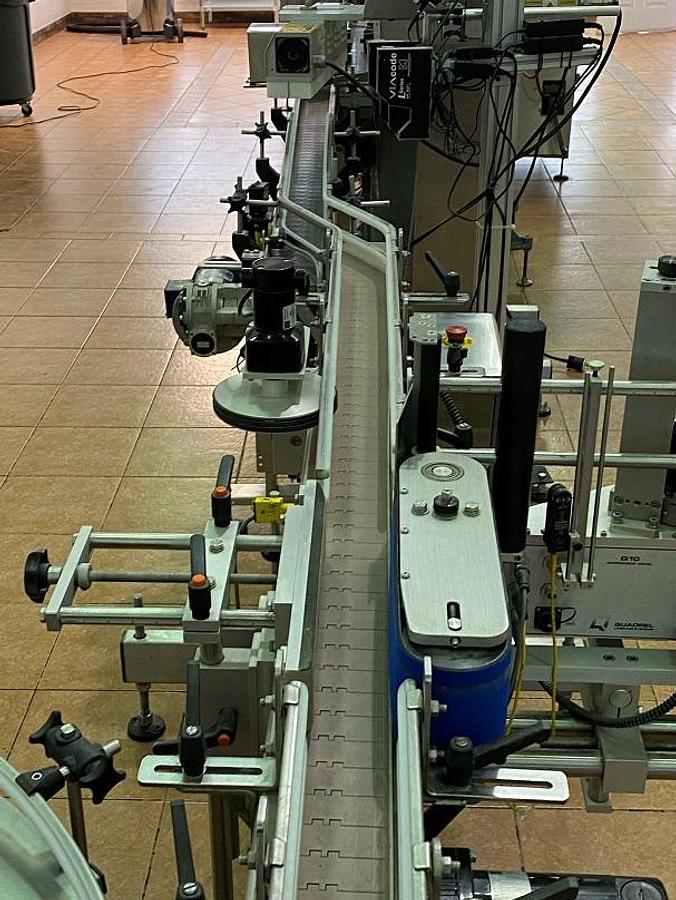 Used Quadrel “Moduline” Automatic Pressure Sensitive Wraparound Labeler