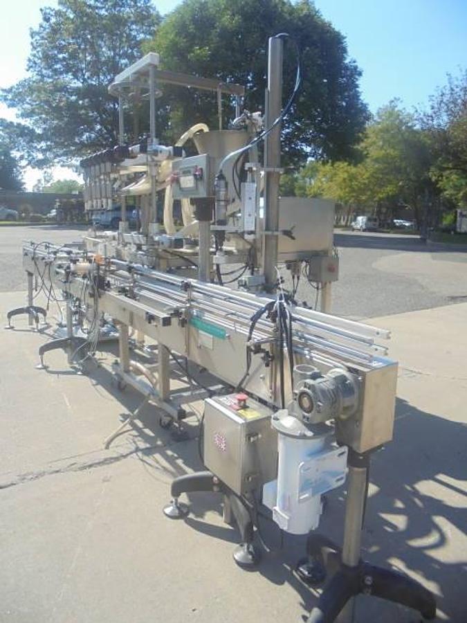 Used Inline Filling Systems “Servo” Six Nozzle Positive Displacement Pump Style Filler