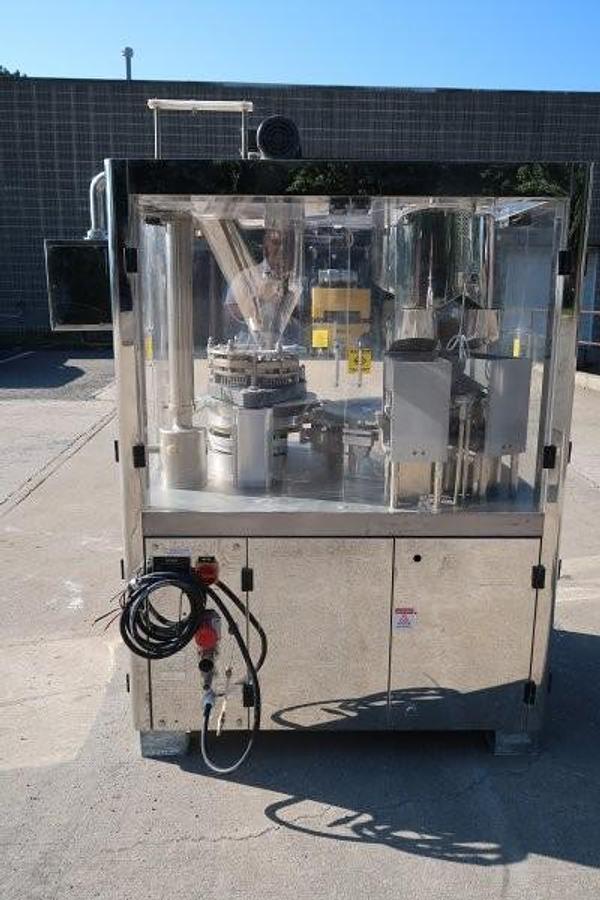 Used Tradamax Equipment and Supply Automatic capsule Filling Machine, 11 Station
