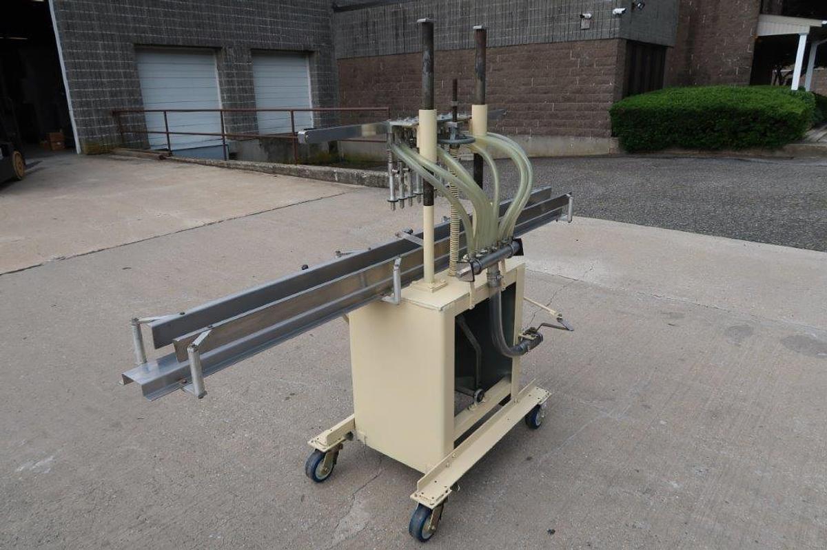 Used 8 Spout Semi-Automatic Liquid Filler, Portable
