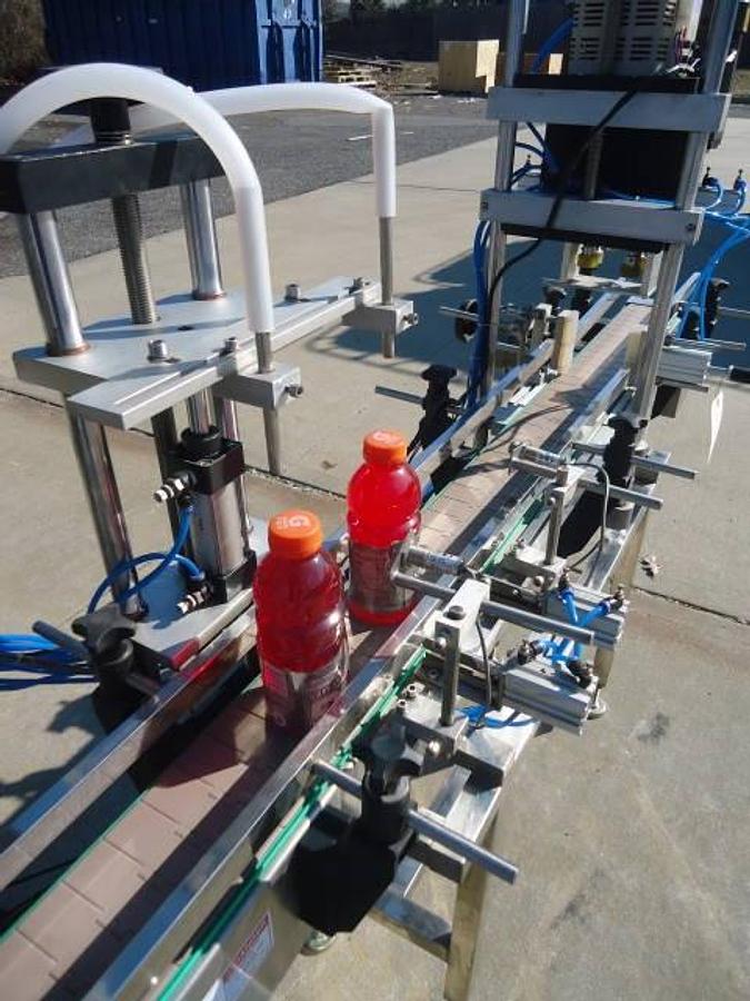 Used Ocean Packing Two Head Pump Style Stainless Steel Filling And Capping Machine