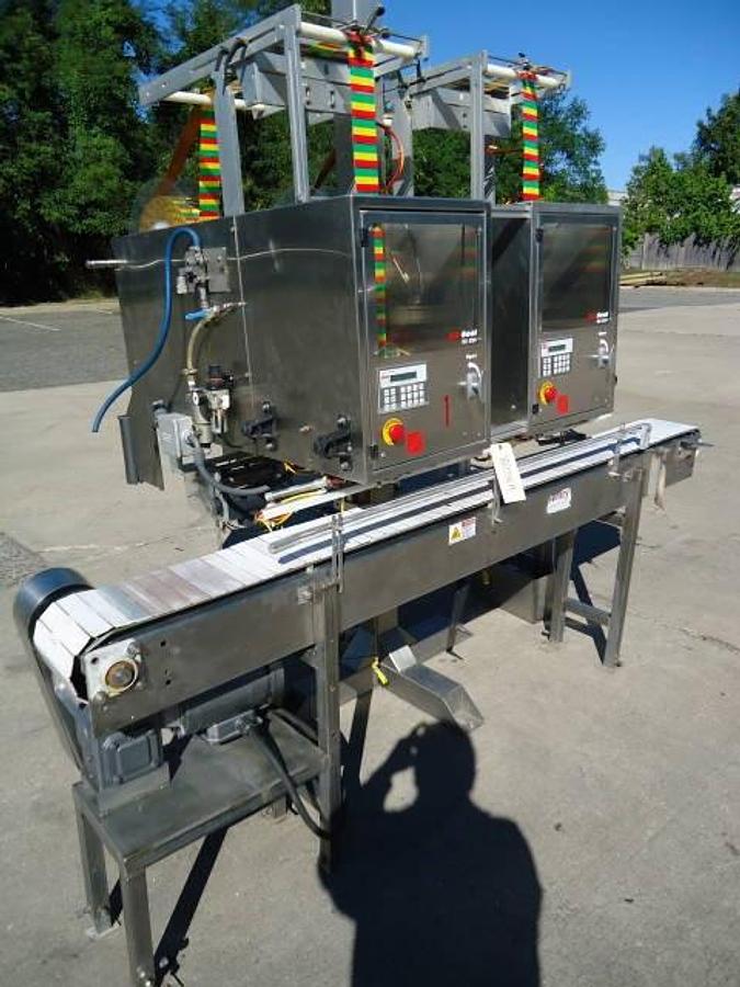 Used Axon EZ-2-200 Dual Station Tamper Evident Neck Bander/Sleever