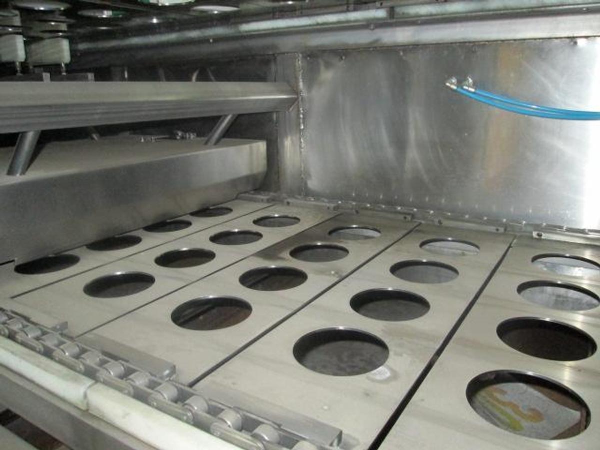 Used BWI Holmatic Opti-Fil four lane cup filling line