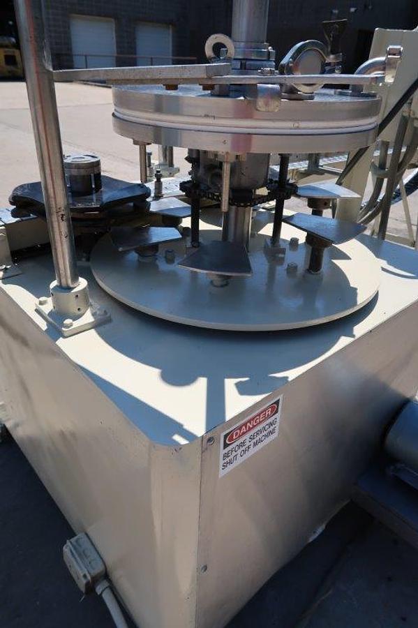 Used MRM “Versa-Fil” Six Head Rotary Time and Pressure Positive Displacement Filling Machine, with Waukesha Pump