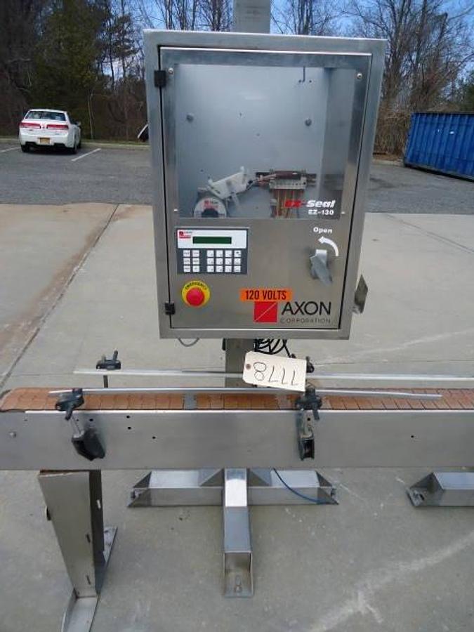 Used Axon Ez-130 Automatic Sleever/Neck Bander With Tunnel