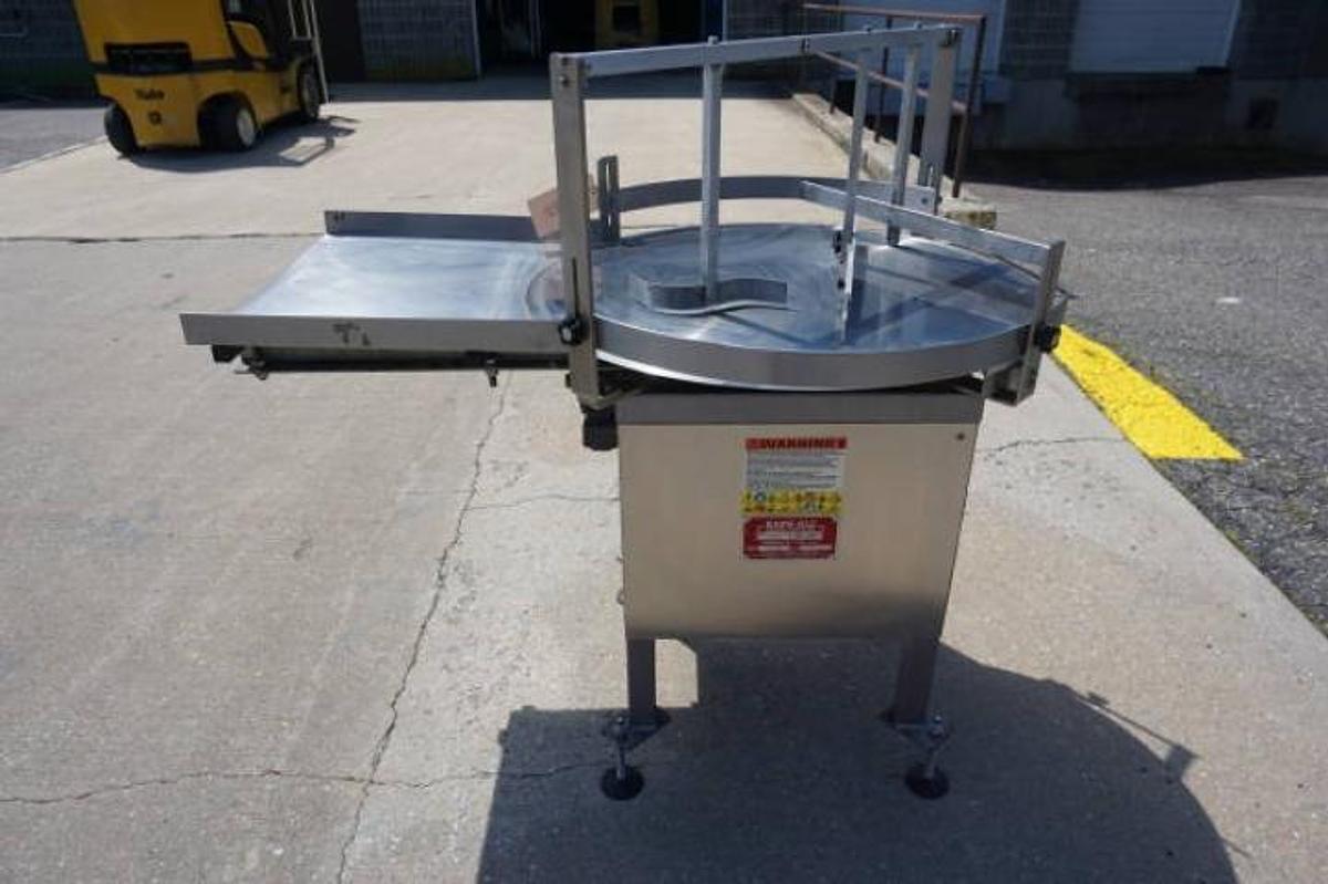 Used 36 In. Kaps-All Stainless Steel Rotary Table, with unscrambling shelf