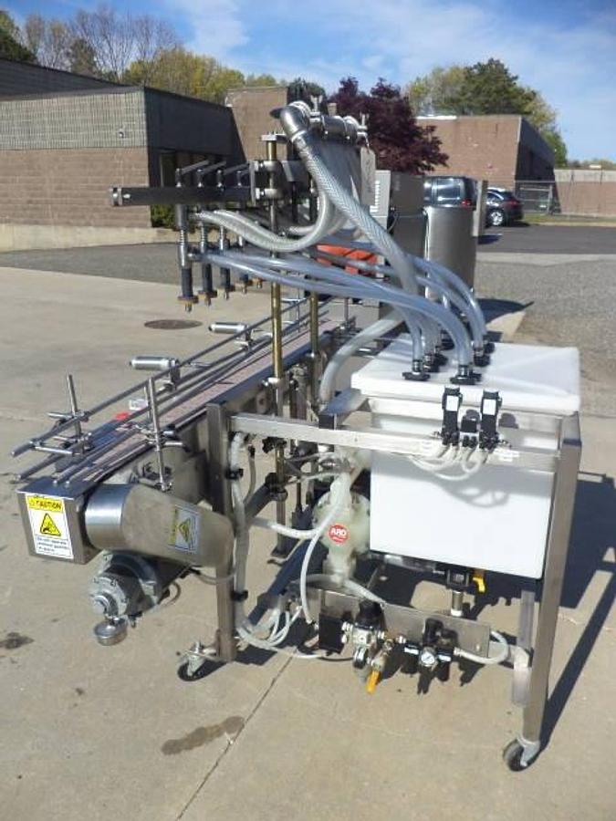 Used Packaging Dynamics Eight Spout Stainless Steel Portable Straight Line Liquid Filler, Explosion Proof