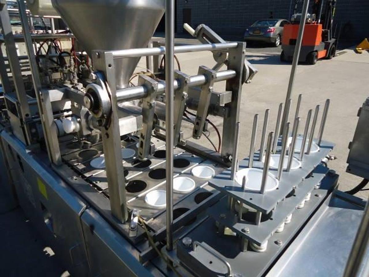 Used Modern Packaging Three Lane Cup Filler/Sealer/Lidder , Stainless Steel