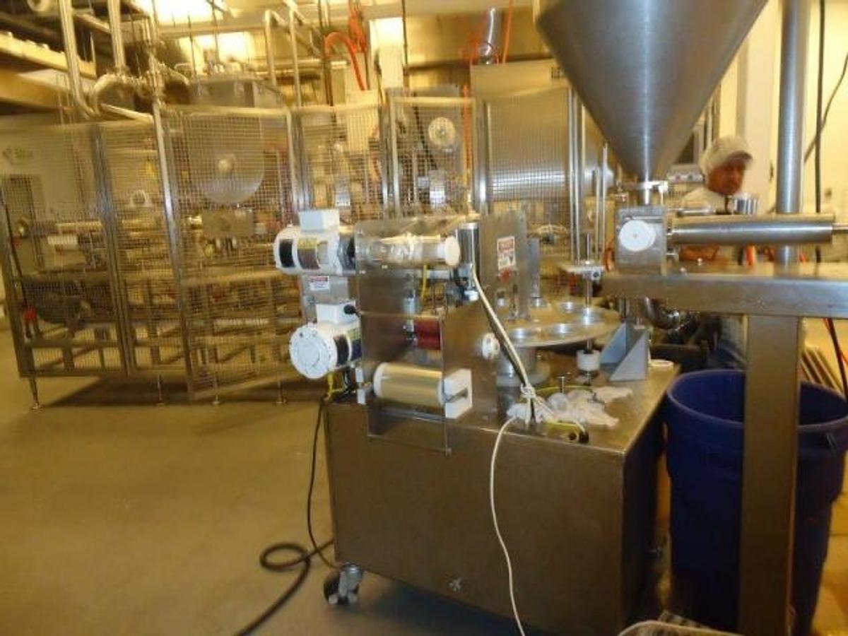 Used World Cup Rotary Cup Filling/Sealing Machine, 40 Per Minute