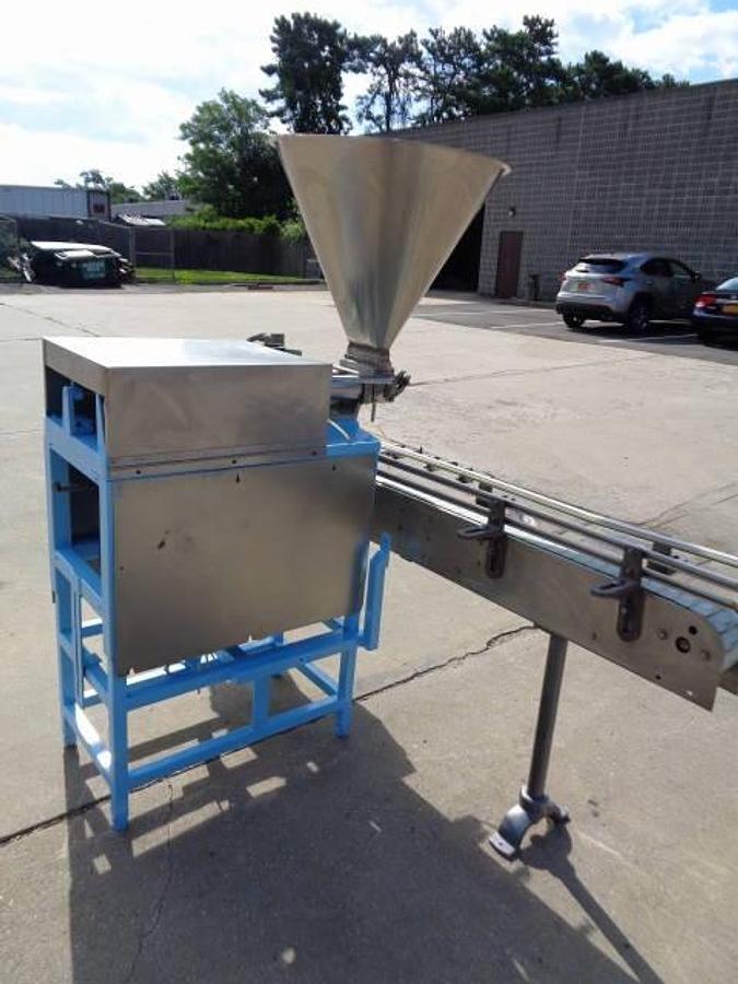 Used Simplex Twin Head Automatic Piston Filler With Indexing Conveyor