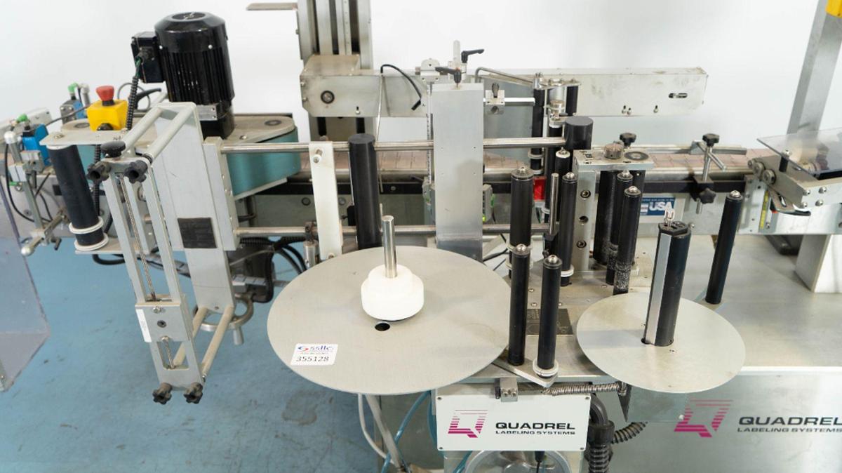 Used Quadrel VersaLine Spot/Wraparound Pressure Sensitive Labeler