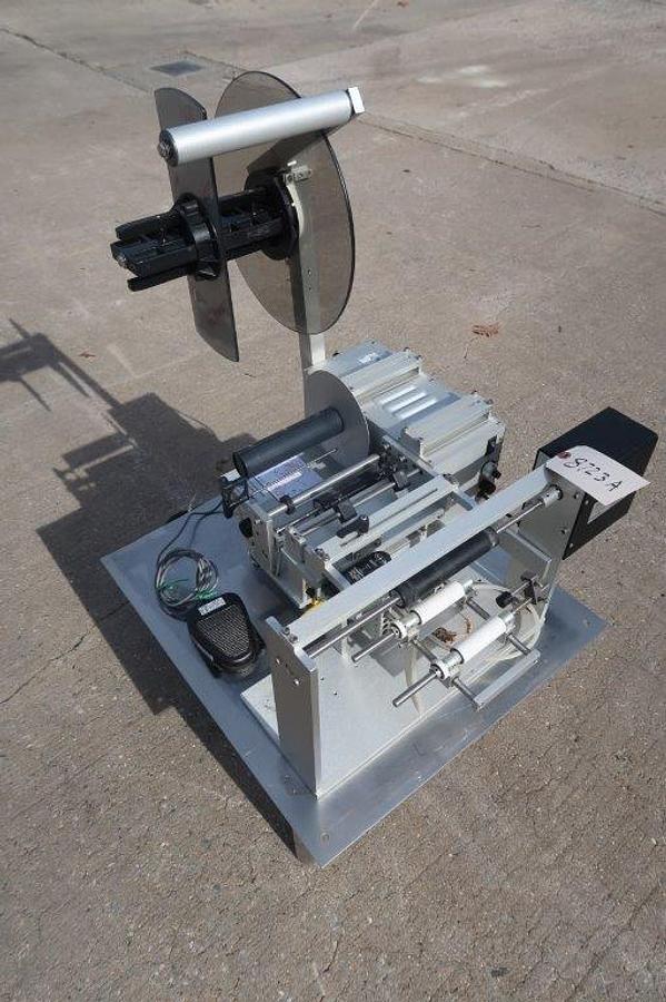 Used Universal R-310 Tabletop Semi-Automatic Pressure Sensitive Spot/Wraparound Labeler