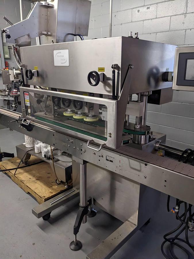 Used Pharmapack Six Spindle Auto Screw Capper, with Waterfall Cap Elevator