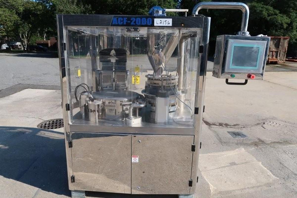 Used Tradamax Equipment and Supply Automatic capsule Filling Machine, 11 Station