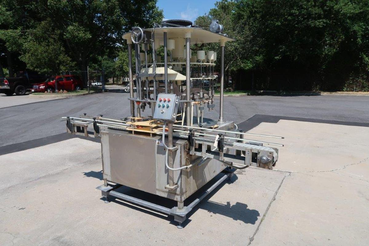 Used Packaging Dynamics 16 Spout Rotary Pressure Gravity Filling Machine, 8-1/2 In. Centers