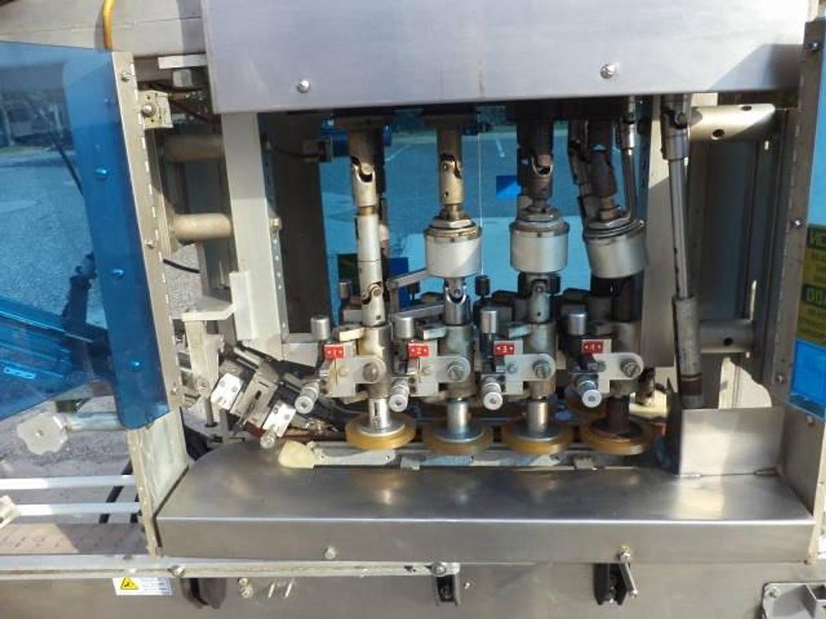 Used Pack West eight spindle inline automatic capper