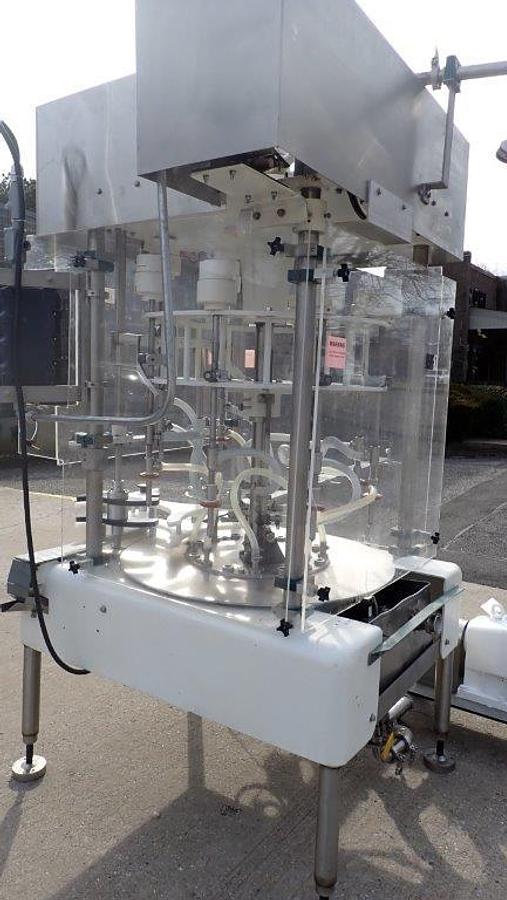 Used MRM 8 Spout Rotary Pressure Gravity Filler, XP