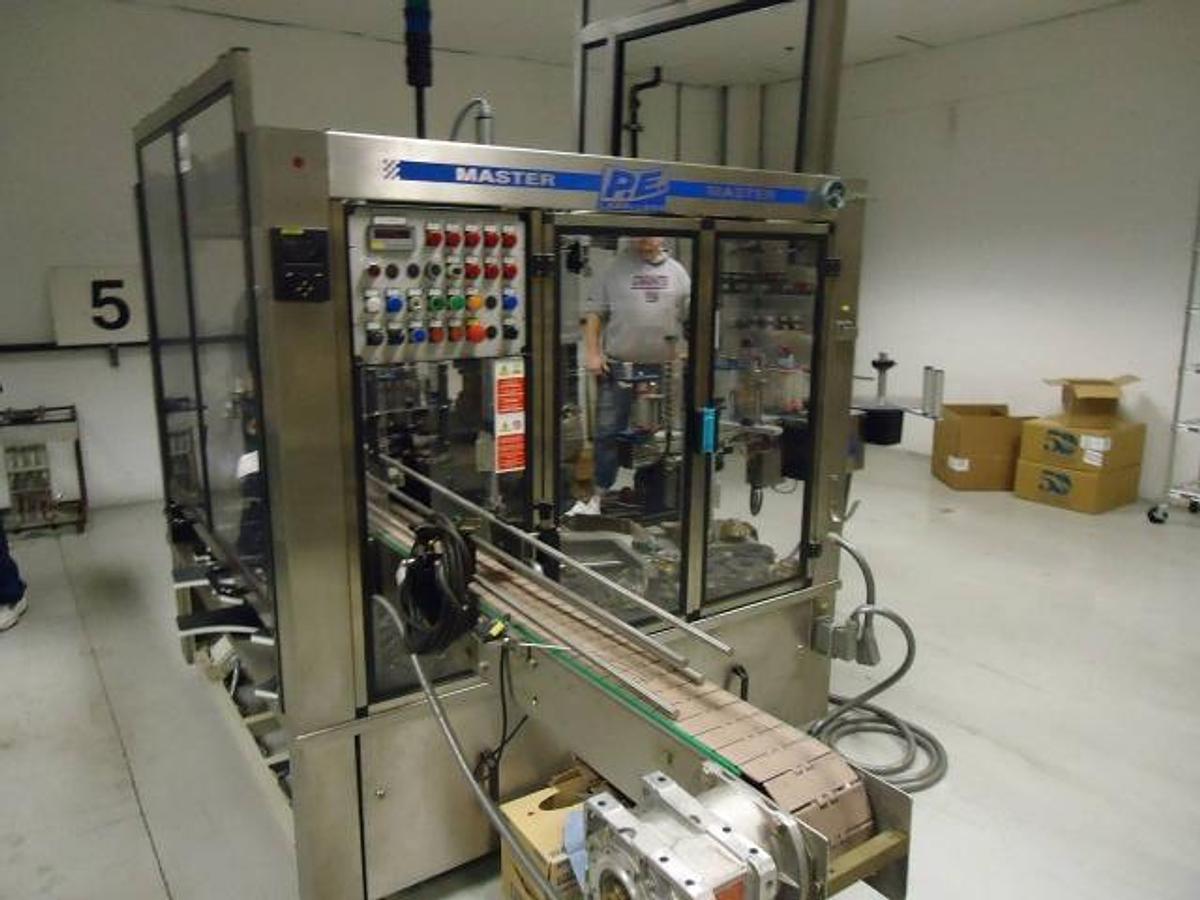Used PE “MASTER M” Front & Back Pressure Sensitive Rotary Labeler