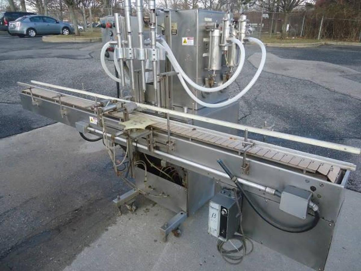 Used NATIONAL INSTRUMENT “FILAMATIC”” FOUR PISTON FILLER WITH CONVEYOR, 32 oz. pistons