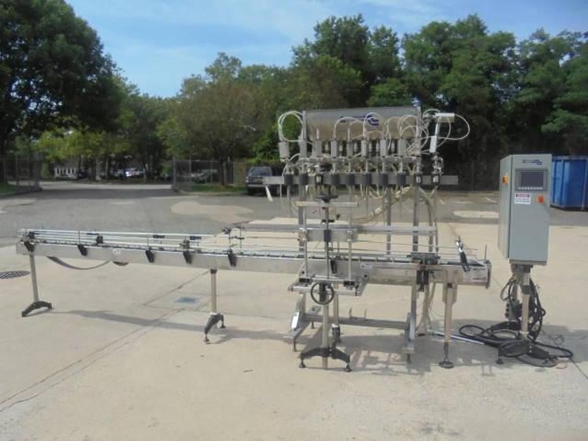 Used Fluid Packaging Solutions 10 Spout SS Gravity Liquid Filler, “Bottom Up” Fill