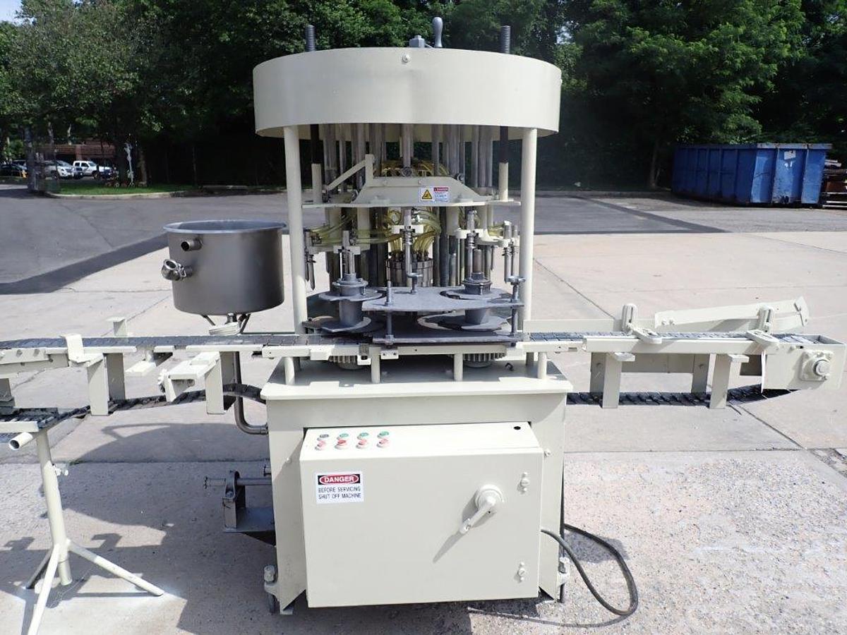 Used New Way 12 Spout Rotary Pressure Gravity Liquid Filling Machine, 8-1/4 In. Centers