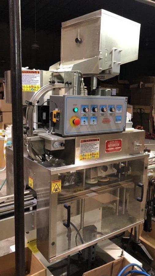 Used Kaps-All E-4 Four Spindle Capper With Conveyor