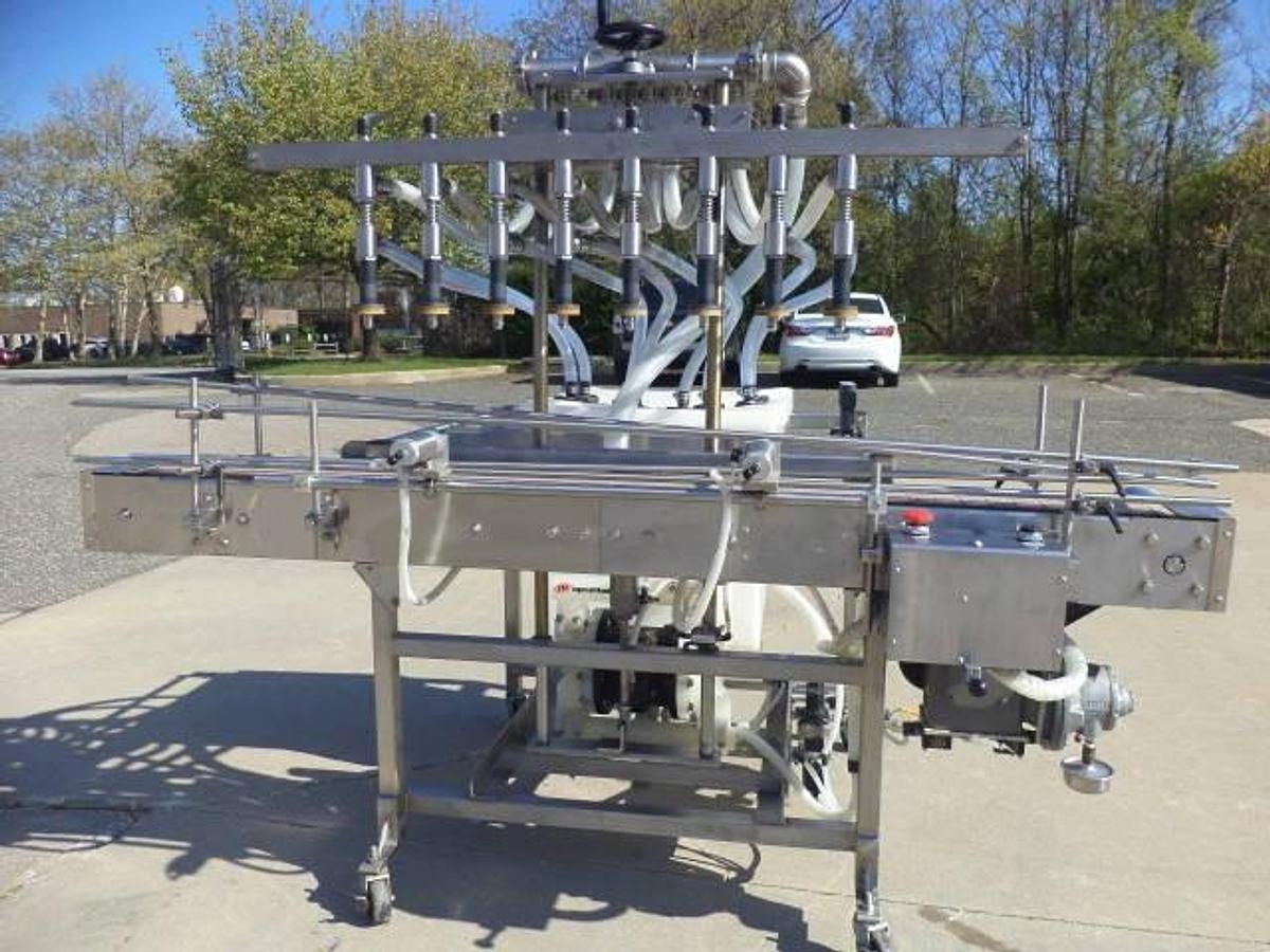 Used Packaging Dynamics Eight Spout Stainless Steel Portable Straight Line Liquid Filler, Explosion Proof