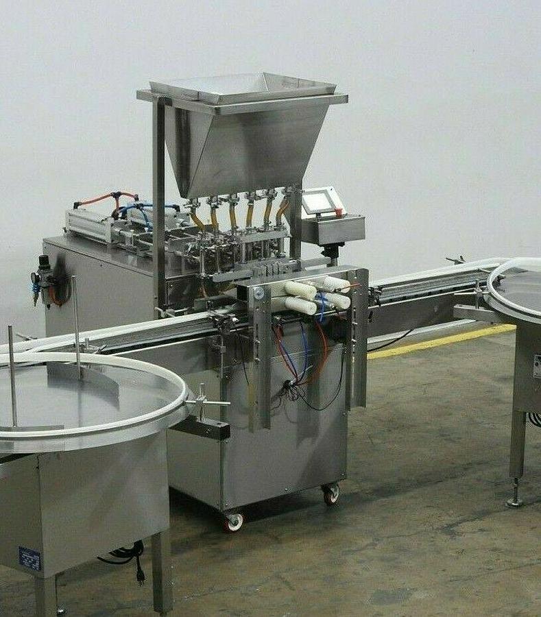 Used Accutek Six Piston Fully Automatic Straightline Filling Machine
