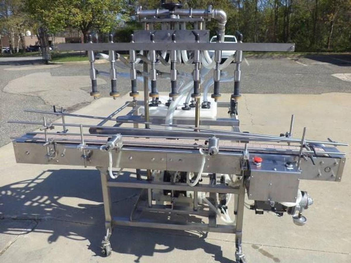 Used Packaging Dynamics Eight Spout Stainless Steel Portable Straight Line Liquid Filler, Explosion Proof