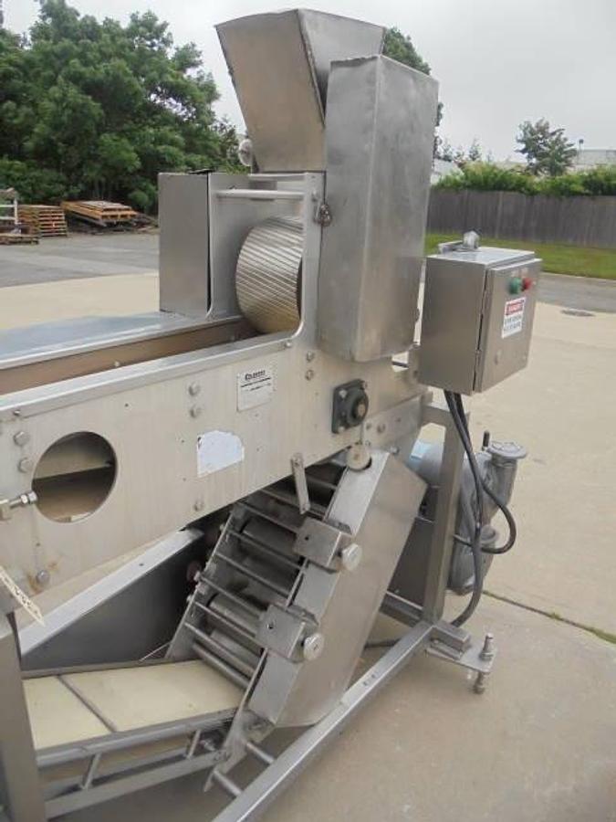 Used Colborne T-28000 Automatic Turnover Pie Machine, tooled currently for Jamaican Beef Patties