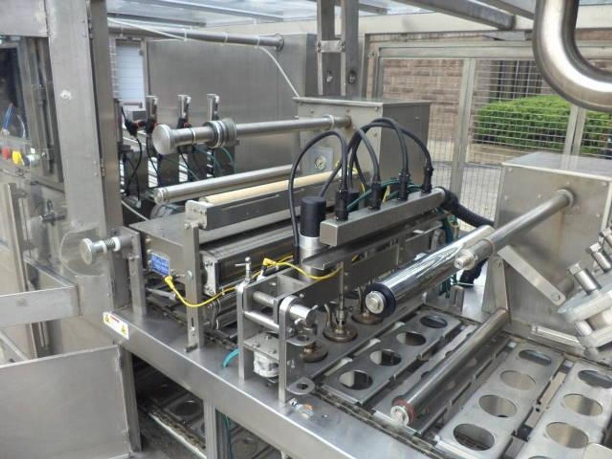 Used Holmatic OF-2340 “OPTI-FIL” Four Lane Cup Filler/Sealer/Overcap System