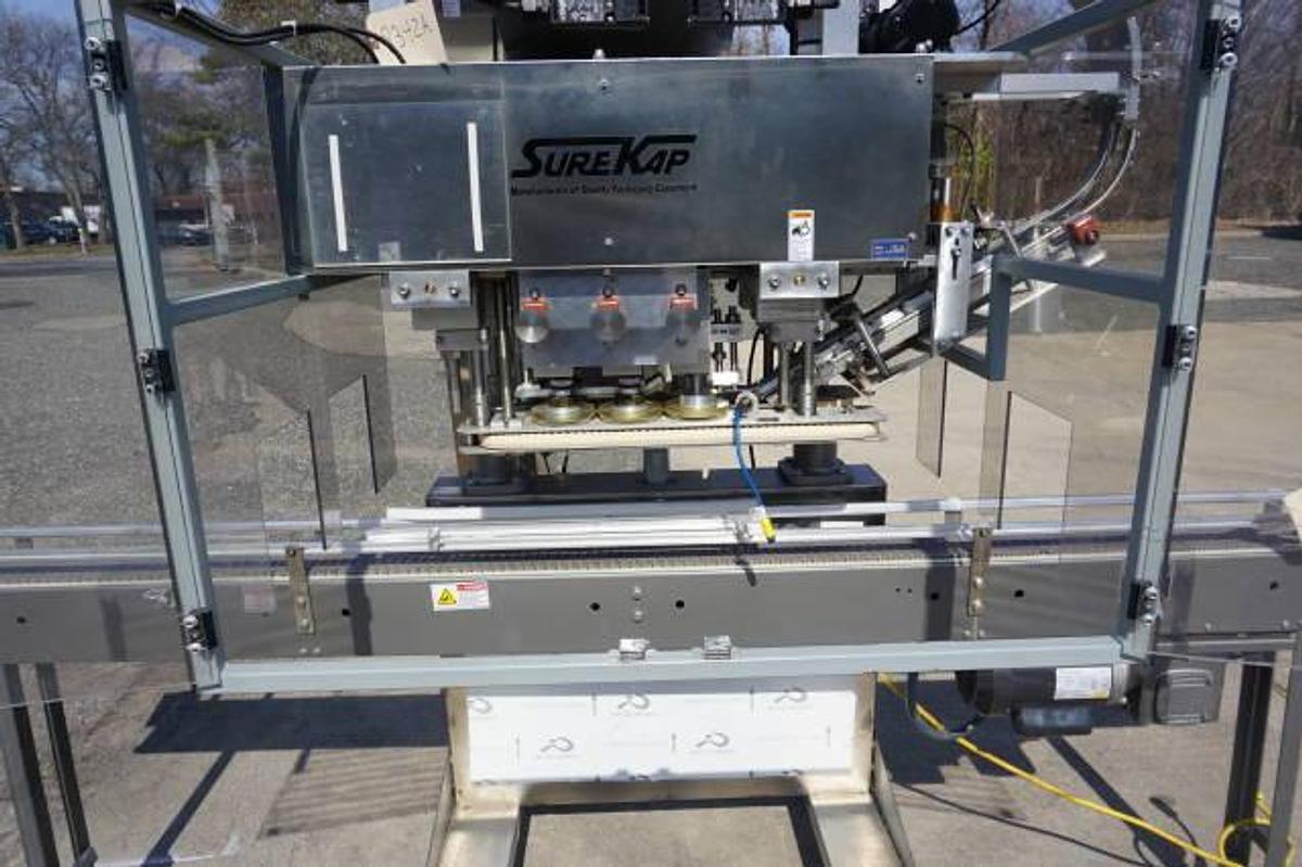 Used Surekap SK6000-BF6 Six Spindles Capper With Elevator