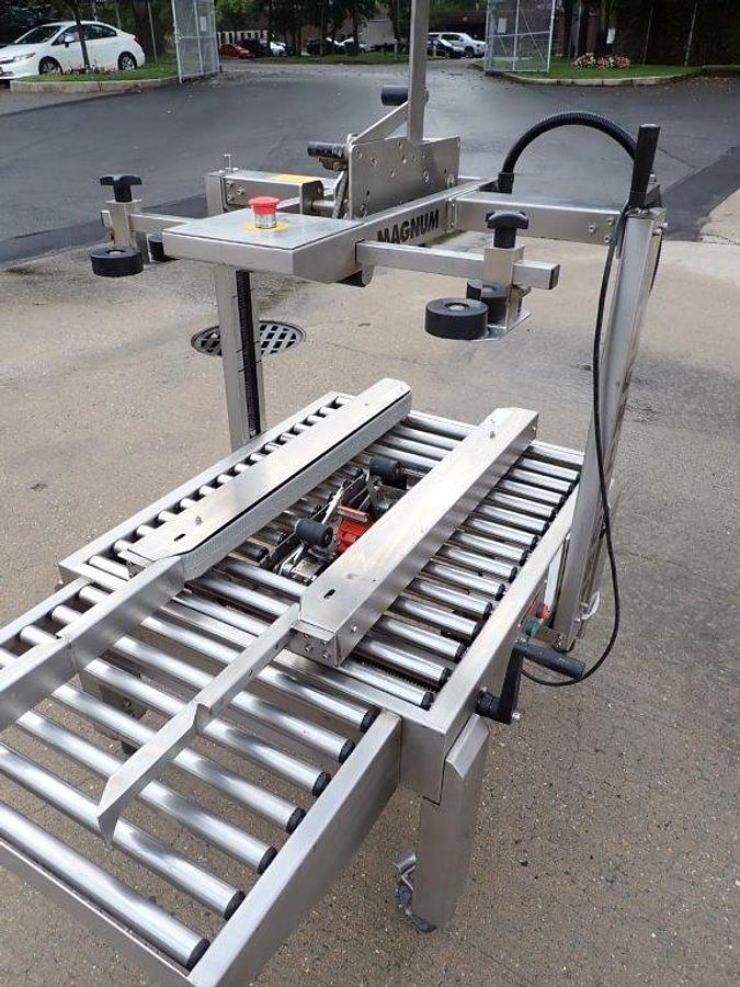 Used Highlight Industries “Magnum 2300-SDU” Stainless Steel Top and Bottom Case Taper