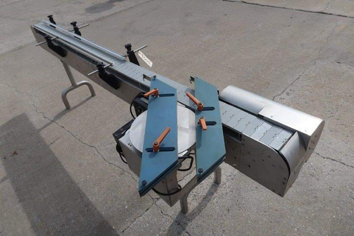 Used 9-1/2 Ft. Long Stainless Steel Motorized Bottle Conveyor