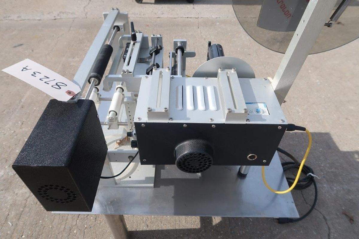 Used Universal R-310 Tabletop Semi-Automatic Pressure Sensitive Spot/Wraparound Labeler