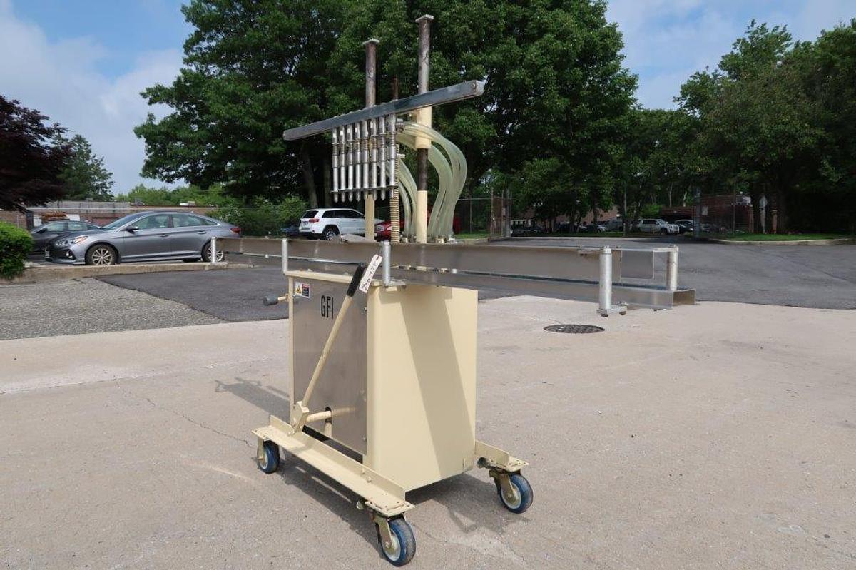 Used 8 Spout Semi-Automatic Liquid Filler, Portable