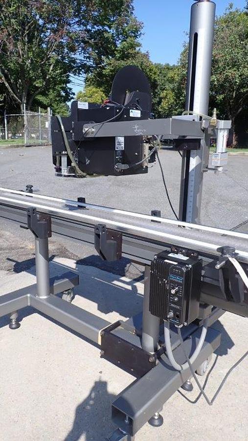Used Action Packaging System Auto Top Labeler, w/Conveyor