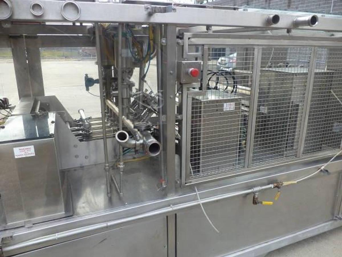 Used Holmatic OF-2340 “OPTI-FIL” Four Lane Cup Filler/Sealer/Overcap System